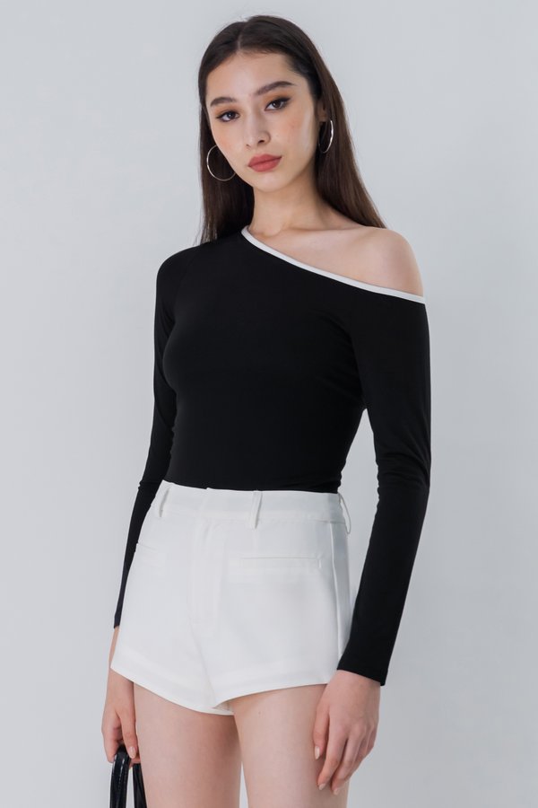 Knock Out Slant Hem Shorts in White