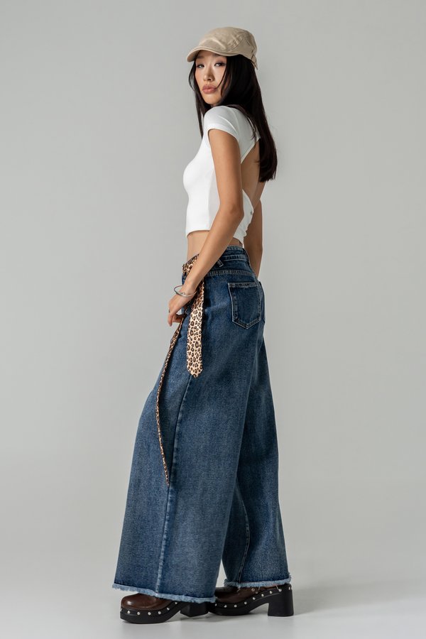 Flare Raw Hem Jeans in Med Wash