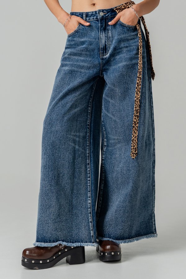 Flare Raw Hem Jeans in Med Wash